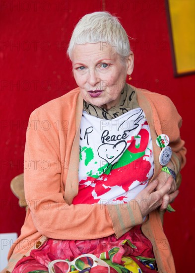 Vivienne Westwood poses for photographers at Glastonbury Festival. Fashion designer Westwood was speaking against fracking in the Greenpeace Village.