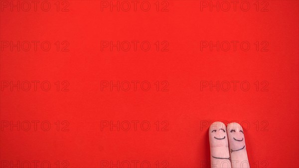 Happy finger face couple in love hugging, enjoying perfect date, love, top view