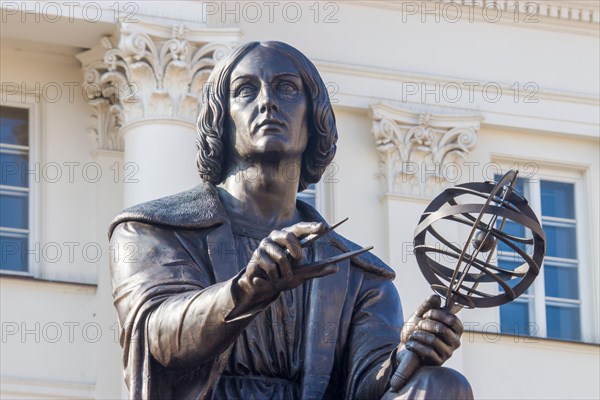 The Statue of astronomer Nicolaus Copernicus in Warsaw Poland, who who formulated a model of the universe that placed the Sun rather than the Earth