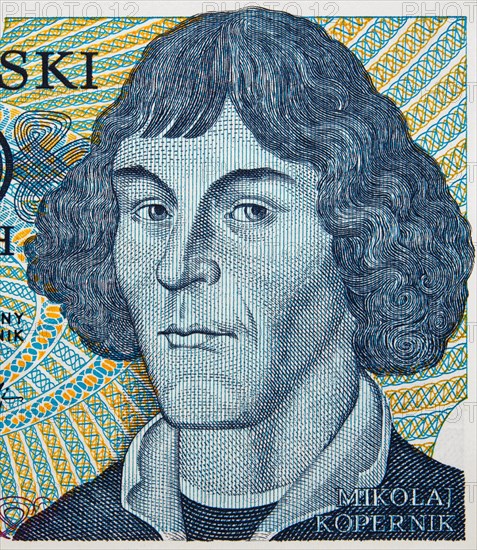 Nicolaus Copernicus face portrait on Poland zloty banknote closeup. Genius renaissance mathematician and astronomer.