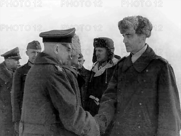 Field Marshal Paulus meets with Colonel General Heitz and other German officers, captured in Stalingrad. Photographed here are Generalleutnant Alexander Edler von Daniels (far left), Generalleutnant Hans-Heinrich Sixt von Arnim (2nd left), Generaloberst Walter Heitz (3rd left), Oberst Wilhelm Adam (2nd right) and Generalfeldmarschall Friedrich Paulus (far right) 4 February 1943