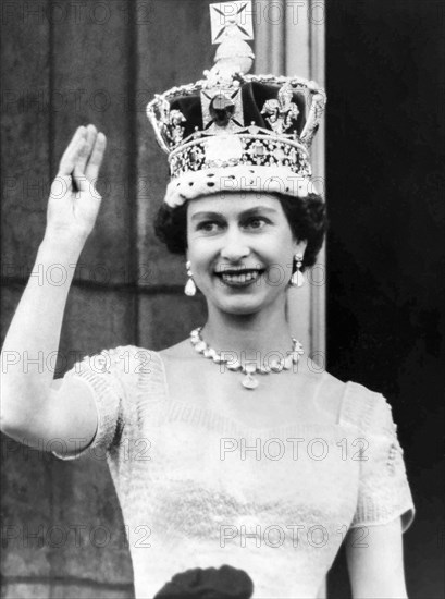 Queen Elizabeth II waves from the Buckingham Palace balcony after her Coronation on June 2, 1953 in London, England.