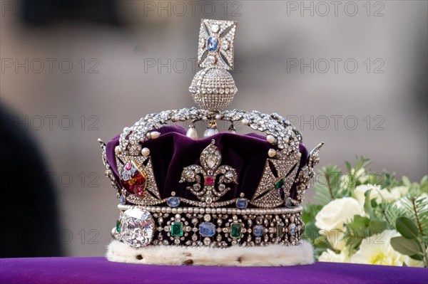 Queen Elizabeth II's coffin is taken in procession on a Gun Carriage of The King's Troop Royal Horse Artillery. The Coffin is draped with the Royal Standard with the Imperial State Crown on top followed by King Charles III and immediate Royal family at Whitehall, London, United Kingdom, 14th September 2022(Photo by Richard Washbrooke/News Images)