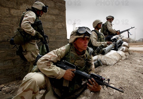 Iraq War April 2003 Baghdad American marines take postions in Eastern Baghdad as they liberate the city Mirrorpix
