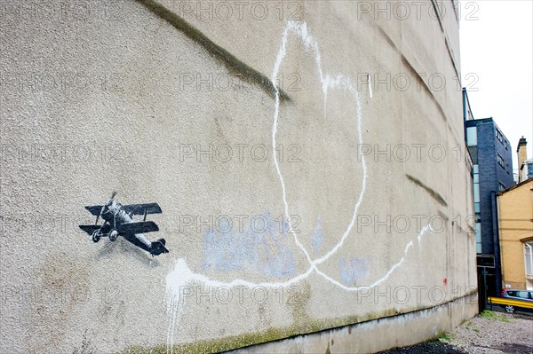 Banksy graffiti artwork on display in Liverpool, UK.