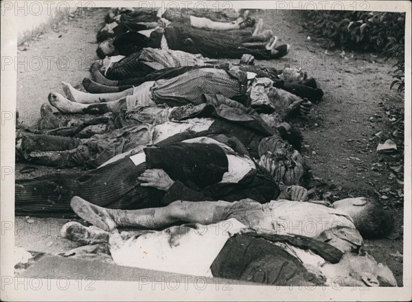 Nov. 11, 1937 - Bodies laid out for burial after Insurgent planes had bombed a school in Barcelona during Spanish civil war. Cr