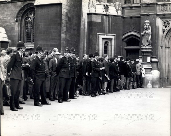 Jun. 17, 1963 - Crucial Debate Opens At Westminster:The crucial debate on the PROFUMO affair opened in the House of Commons this afternoon. Photo shows A line of policemen control the head of the huge queue that formed for places in the public gallery to listen to the debate.