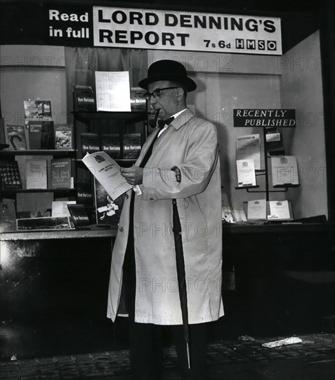 Sep. 09, 1963 - Lord Denning's report published. businessmen read it Lord Denning's report on the security aspects of the profumo affair published by the stationery office at 12.30 am today. photo shows Mr. Ernest Handley from Leeds, a business manager reads the Denning report this morning.