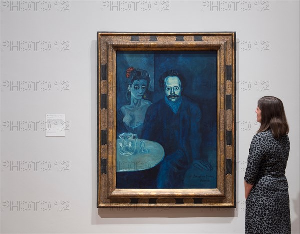 National Portrait Gallery, London, UK. 5th October, 2016. Picasso Portraits, a major exhibition opening at the National Portrait Gallery on Thursday 6 October 2016. The only blue period painting in the exhibition is Portrait of Sebastia Junior i Vidal, Oil on Canvas, 1903. This portrait is on loan to this exhibition until Sunday 6 November 2016. Los Angeles County Museum of Art, David E. Bright Bequest. Posed with a member of gallery staff. Credit:  artsimages/Alamy Live News