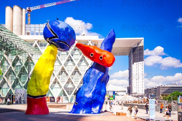 "Personnages Fantastiques" is a colourful outdoor artwork and represent two dancers playing together amongst the high-rises at La Defense,Paris,