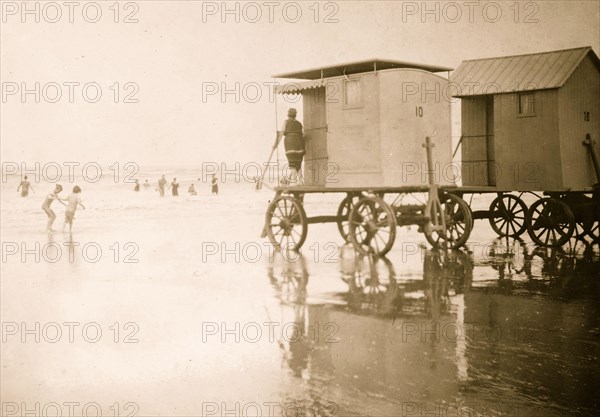 Beach at Scheveningen with dressing cabins in Hollandnear the Hague.