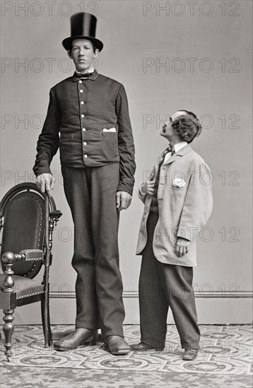 James Hugh Murphy Jr (1842-1875) was born in Waterford, Ireland and died in Baltimore, USA. Known as the Irish Giant and the Baltimore Giant, he toured with P.T. Barnum, being billed as being over 8' tall.