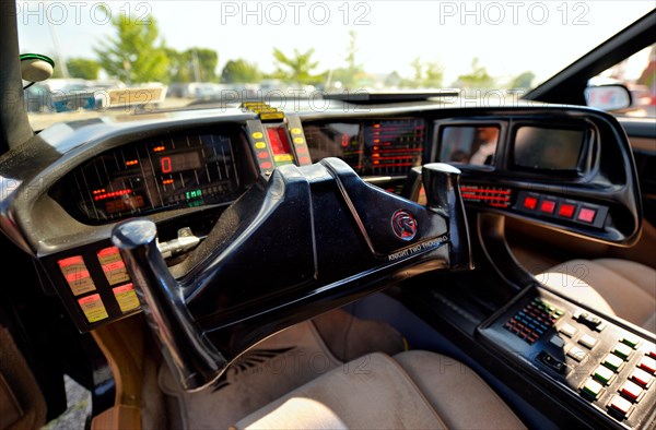 Garden City, New York. 15th June 2013. A Knight Rider Car, which was used for promo shots for the 2008 TV pilot, is at the Eternal Con Pop Culture Expo, which was hosted by the Cradle of Aviation Museum of Long Island. The dashboard's lit control panel displayed changing information and spoke messages. Credit:  Ann E Parry/Alamy Live News