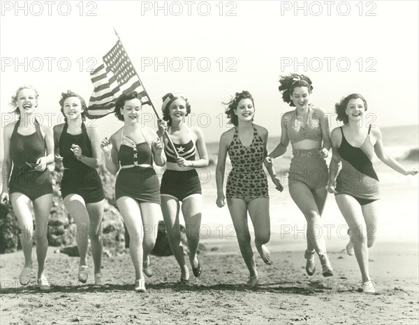 Patriotic women at the beach (OLVI008_OU075_F)