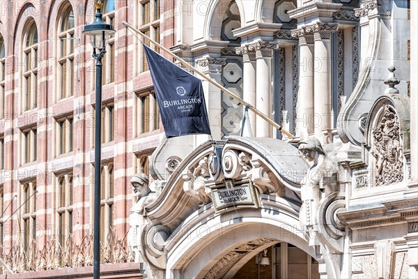 London, UK - June 22, 2018: The Royal Academy of Arts institution at Burlington House on Piccadilly Circus with Arcade banner entrance closeup with no