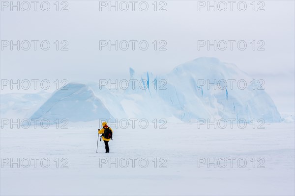 Trekking in the Antarctic Landscape. Traversing the sea ice of Snow Hill Island, Antarctica.