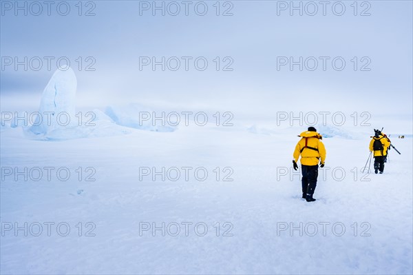 Trekking in the Antarctic Landscape. Traversing the sea ice of Snow Hill Island, Antarctica.