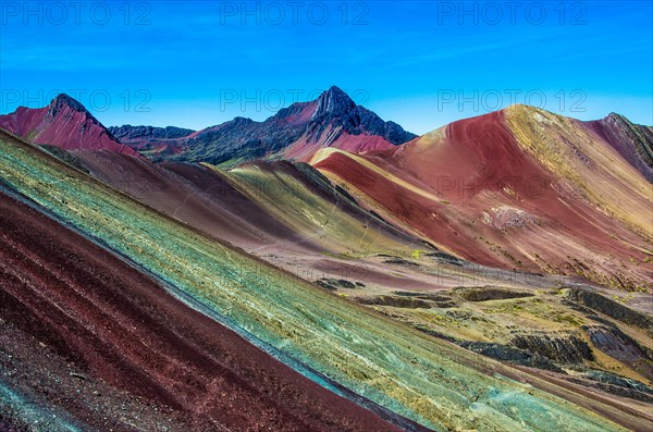 Vinicunca, Peru - Rainbow Mountain (5200 m) in Andes, Cordillera de los Andes, Cusco region in South America. Mountains Peru landscape