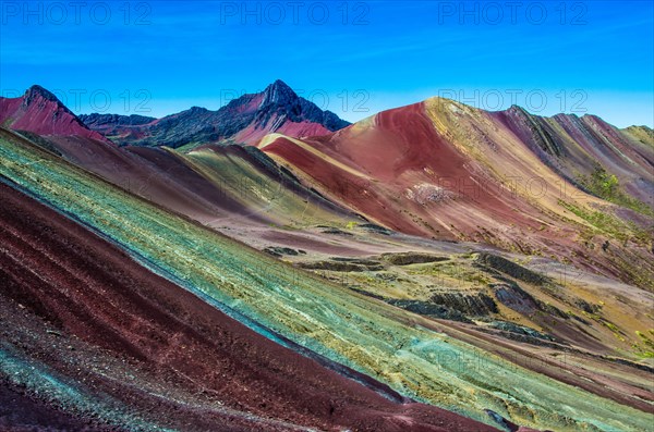 Vinicunca, Peru - Rainbow Mountain (5200 m) in Andes, Cordillera de los Andes, Cusco region in South America. Mountains Peru landscape