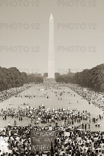 Washington; D.C.; Poor People's Campaign; Solidarity Day; June 19; 1968.  The crowd in the foreground is standing on the steps before the Lincoln Memorial; looking towards the Reflecting Pool and the Washington Monument.  It looks much as it did on August 28; 1963 for the March on Washington at which Martin Luther King; Jr. gave his famous 'I Have a Dream' speech.