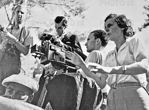 LENI RIEFENSTAHL (1902-2003) German film director and actress directing the 1938 film Olympia. It was released in two parts which together ran for nearly four hours celebrating  the 1936 Summer Olympics in Berlin.