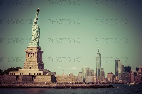 The statue of Liberty  with blue sky background.