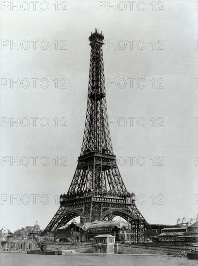 The 19th century vintage photo of construction work of the Eiffel Tower. March 1889. Paris, France.