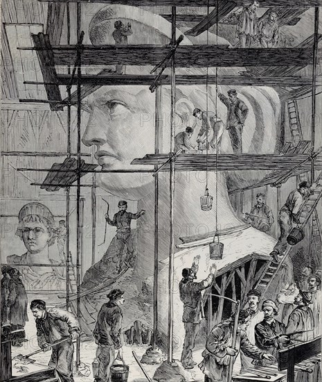 Eng translation : " THE COLOSSAL STATUE OF LIBERTY, DESTINED FOR THE ENTRANCE TO THE PORT OF NEW-YORK.MODELING OF THE HEAD OF THE STATUE IN THE WORKSHOPS OF MM. MONDUIT AND BECHET, IN PARIS  " - Original in french : " LA STATUE COLOSSALE DE LA LIBERTÉ, DESTINÉE A L'ENTRÉE DU PORT DE NEW-YORK.MODELAGE DE LA TÊTE DE LA STATUE DANS LES ATELIERS DE MM. MONDUIT ET BECHET, A PARIS  " - Extract from "L'Illustration Journal Universel" - French illustrated magazine - 1878