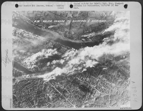 Nantes France 1943-Major damage to shipping and shipyards.