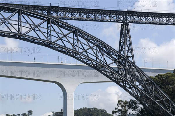 Bridge Dona Maria Pia and Sao Joao in the background in Porto, Portugal.