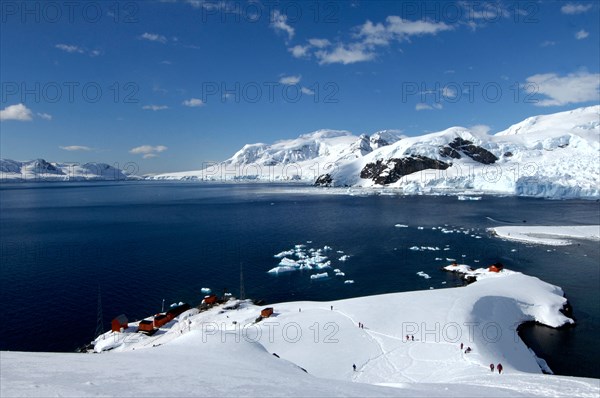 Tourists at Antarctic base Almirante Brown in Paradise Bay, Antarctic Peninsula, Antarctica