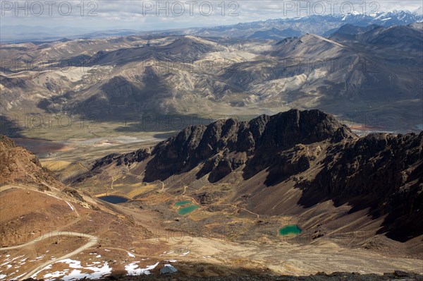 Looking down onto surrounding valley, lakes and mountains of the Cordillera Real, from the 5421 metre (17,785 ft) summit of Chacaltaya, near La Paz, Bolivia