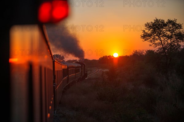 Sunset in the Royal Livingstone Express luxury train. The Steam Locomotive, 156 is a 10th Class originally belonging to Zambia