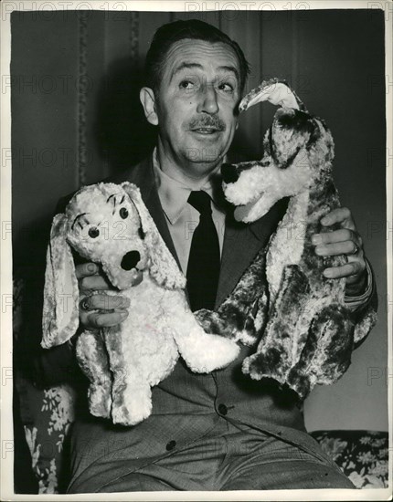 Jul. 07, 1953 - Walt Disney introduces his newest characters ''The Lady'' and ''The Tramp''. A couple of Dogs.: World famous Hollywood cartoonist Walt Disney was to be seen in London today introducing his two new characters - two dogs are called ''The lady and one called ''The Tramp''. The appear in his new cartoon film of the same name (The Lady and The Tramp) which is still in production. Walt Disney explained that a ''Lady'' is a pedigree dog of Coker Spaniel carity - and ''The Tramp'' is a mixed breed - full of fun and collar free