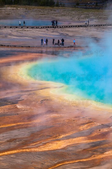 Steam erupts from Grand Prismatic Spring, Yellowstone National Park, Wyoming. The largest hot spring in the United States, it’s
