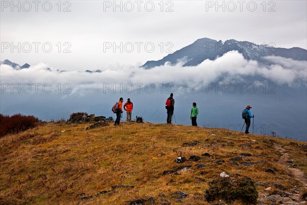 BHUTAN - Trekkers descending off Thombu La preparing to head back down to the Paro Chhu Valley on the Jhomolhari 2 Trek route.