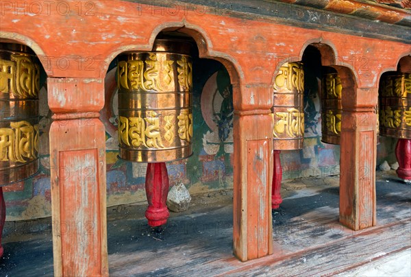 BU00367-00...BHUTAN - Prayer wheels at Kyichu Lhakhang near Paro, one of the oldest Temples in Bhutan.