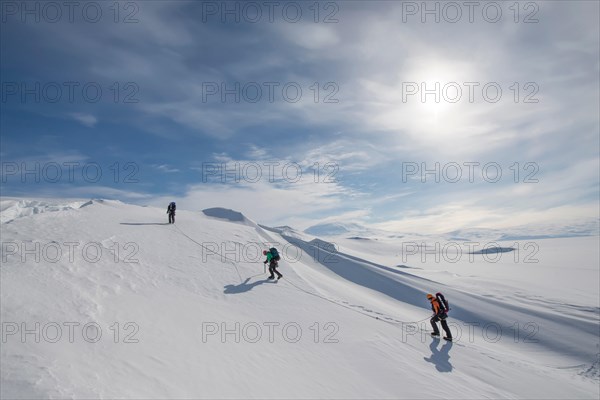 Members of the Joint Antarctic Search and Rescue Team train near crevasses on Ross Island, Antarctica.