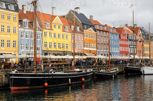 Colourful townhouses along Nyhavn canal in Copenhagen, Denmark