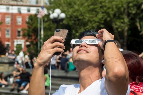 New York, NY 21 August 2017 - eclipse watchers gathered in Washington Square to see a partial solar eclipse. ©Stacy Walsh Rosenstock