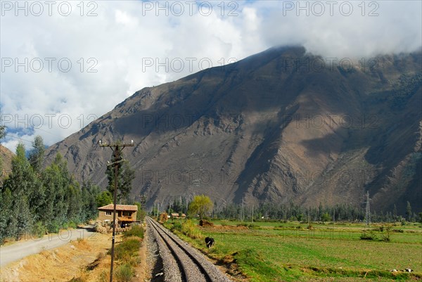 Railroad Tracks through the Andes Mountains in Peru, between Cusco and Machu Picchu