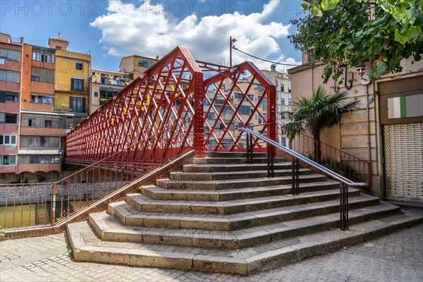 Eiffel bridge across the Onyar River in Girona Spain