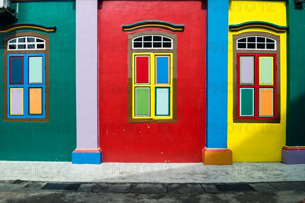 Colorful windows of House of Tan Teng Niah in Little India, Singapore. The building was built 1900, with Southern Chinese and European influences.