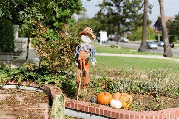 Halloween in front of house decorations