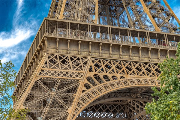 Close up of the detailed intricate Eiffel Tower wrought iron lattice work , The Eiffel Tower is the most visited paid monument in the world , Paris