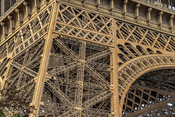 Close up of the detailed intricate Eiffel Tower wrought iron lattice work , The Eiffel Tower is the most visited paid monument in the world , Paris