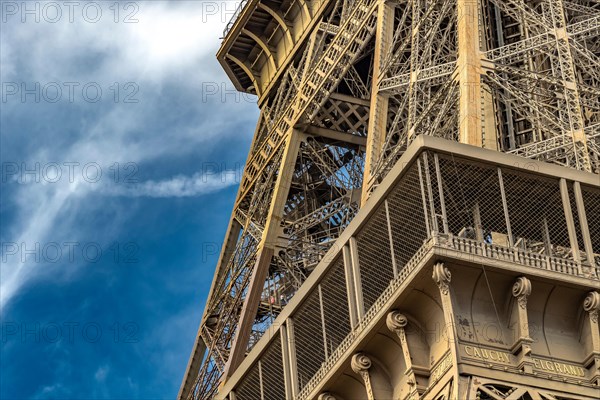 Close up of the detailed intricate Eiffel Tower wrought iron lattice work , The Eiffel Tower is the most visited paid monument in the world , Paris