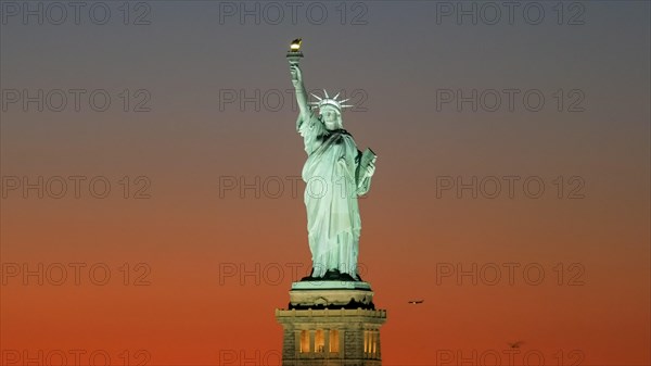 sunset close up of a beautiful statue of liberty in new york