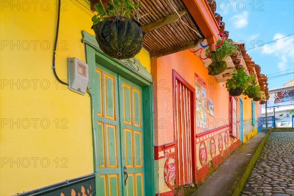 colored houses in the street of Guatape memories