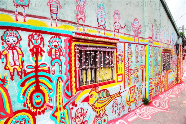 TAICHUNG, TAIWAN - JUL 11: Colorful graffiti dots the walls of the famous Rainbow Village in Taichung, Taiwan. The village has become a must-see attra
